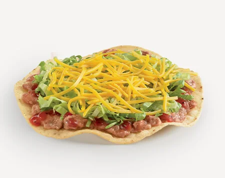 Del Taco Menu Prices | Secret Items, Vegetarian Picks & Combos 28 Del Taco Crunchtada Tostada with beans, salsa, lettuce, and cheddar cheese